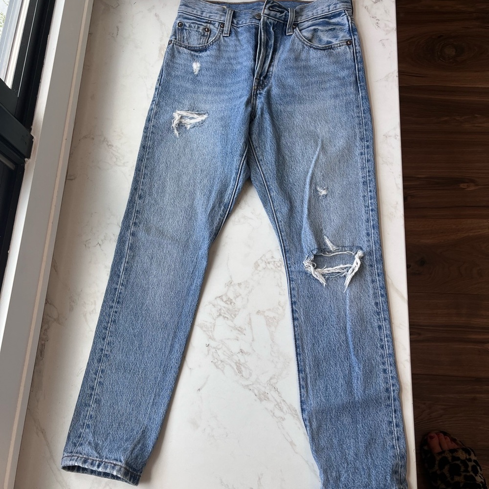 Levi's Women's Light Blue Distressed Straight Jeans